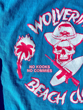 Load image into Gallery viewer, Bright Blue Wolverines Tee, No Kooks, No Commies Beach Club Jolly Roger design.
